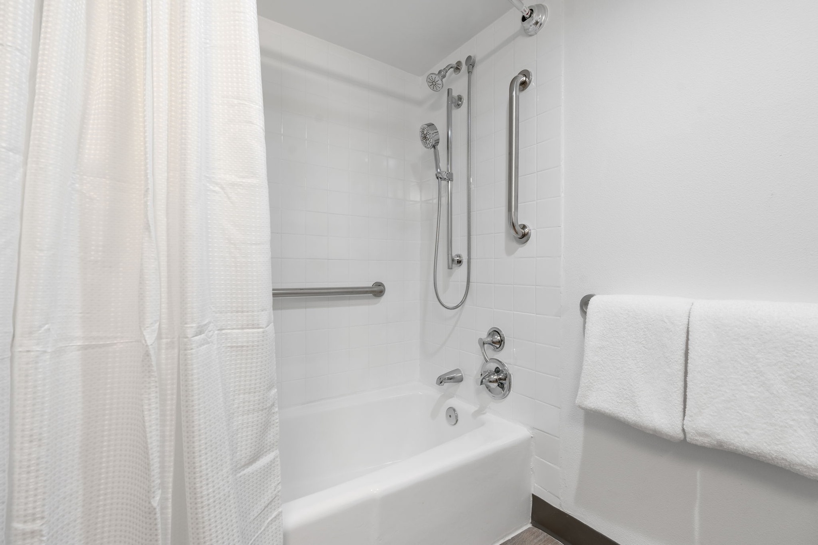 Freshen up in the bathroom with complimentary toiletries and a high pressure shower.