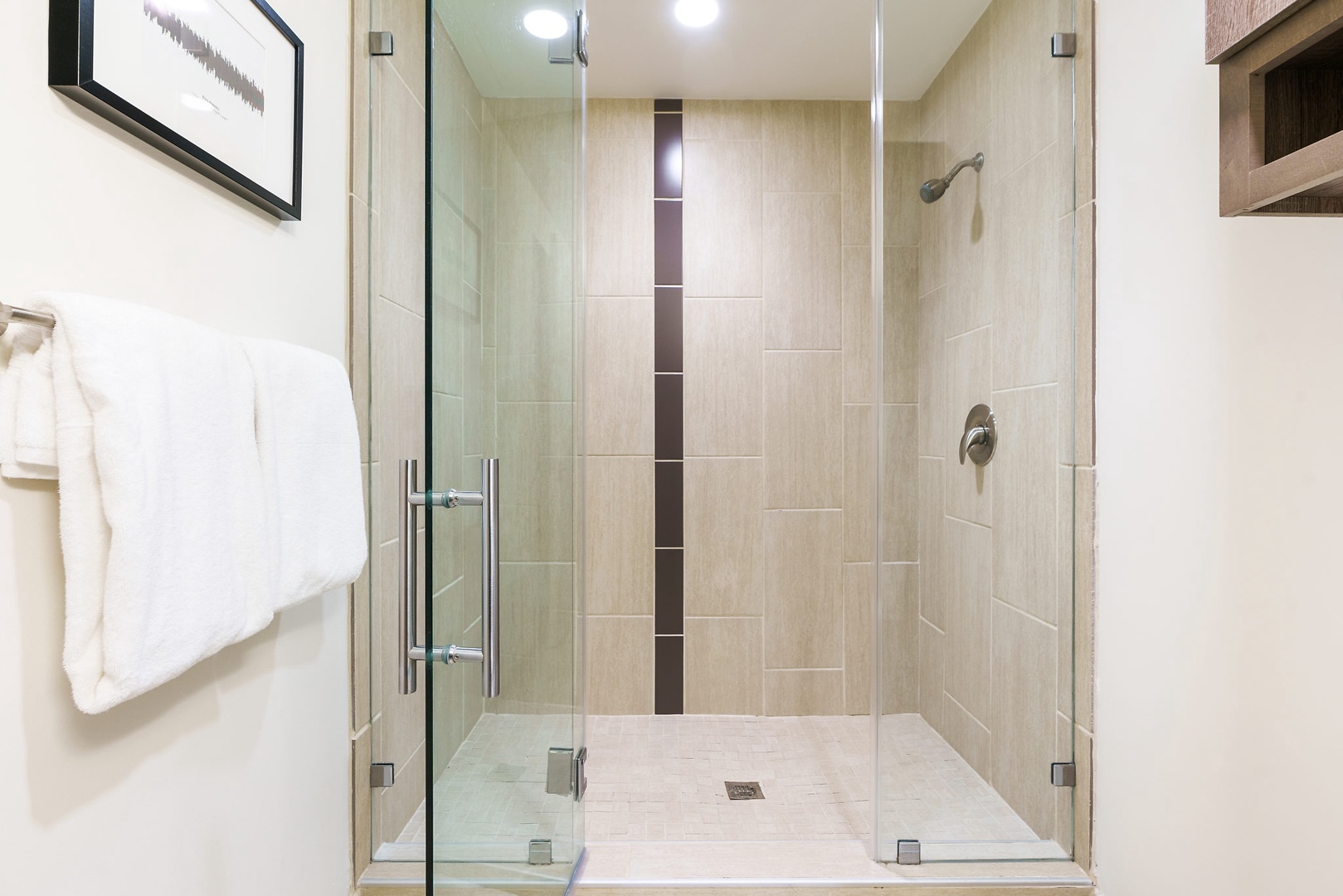 Refresh in the walk-in shower with modern fixtures.