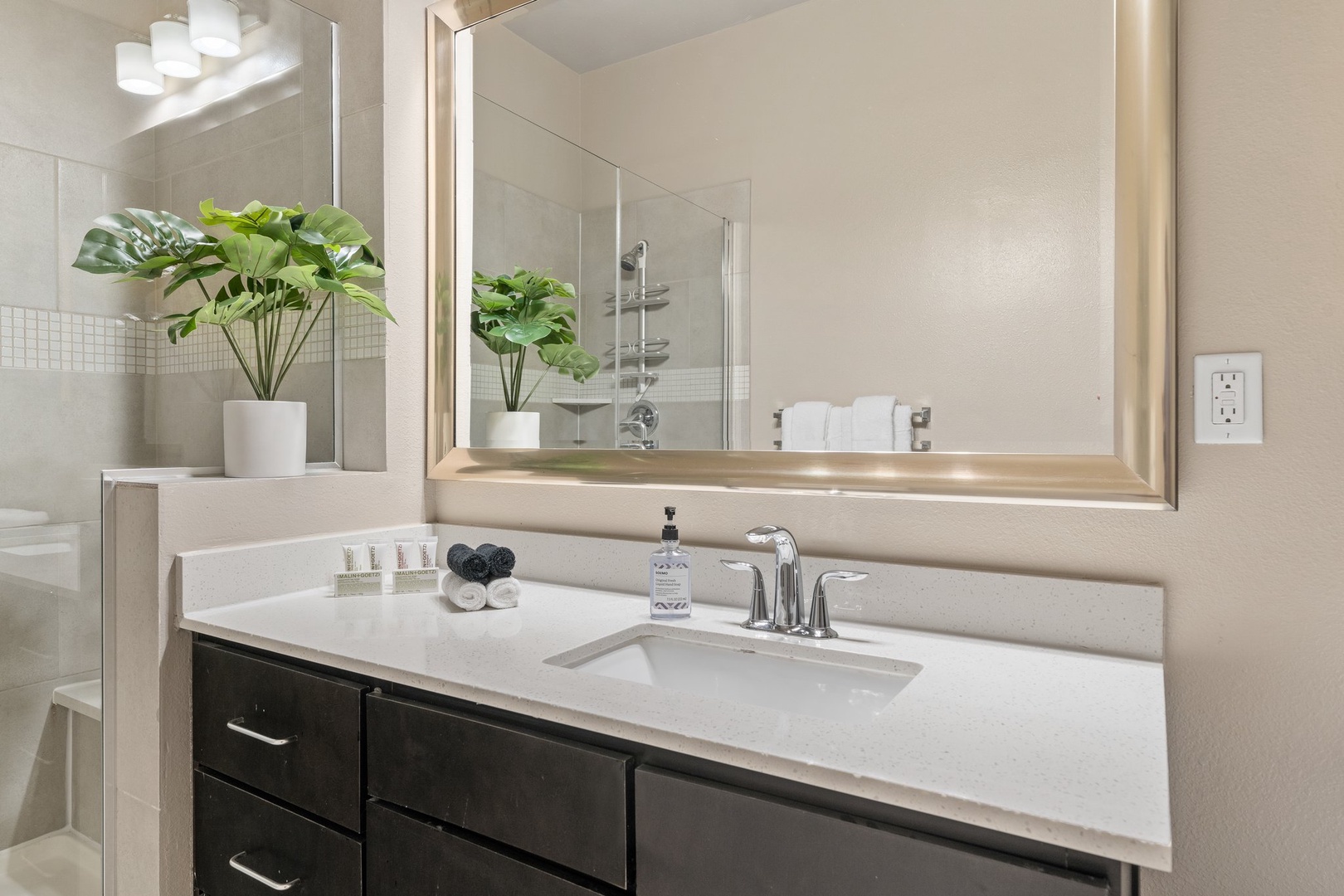 Experience luxury in the modern bathroom with complimentary toiletries.