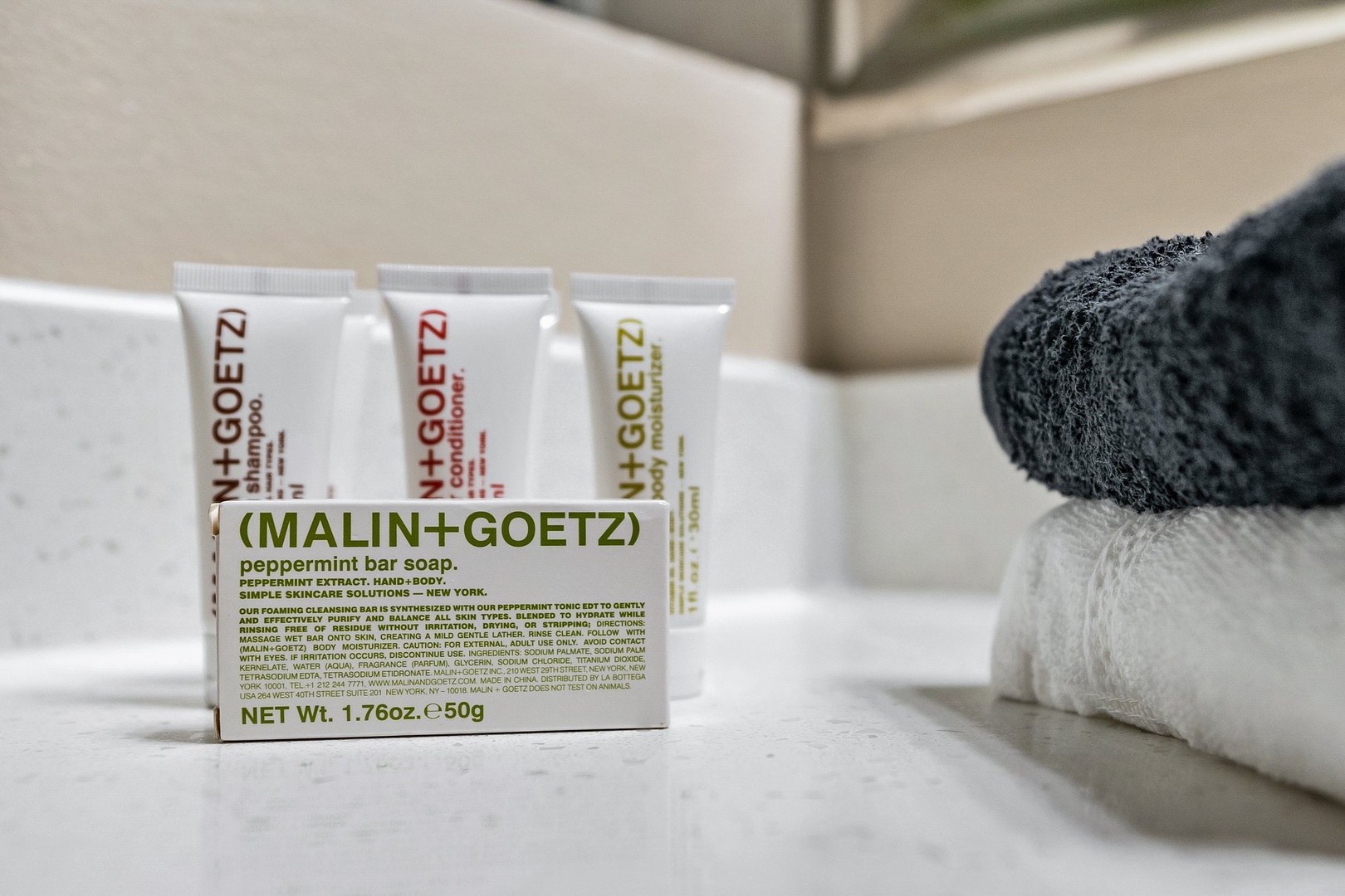 Treat yourself to complimentary toiletries by Malin + Goetz in the bathroom.