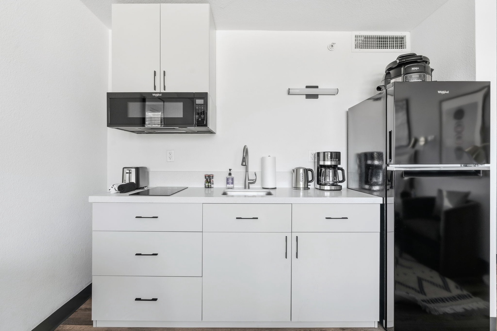 Cook up convenience in our kitchenette, stocked with the essentials.