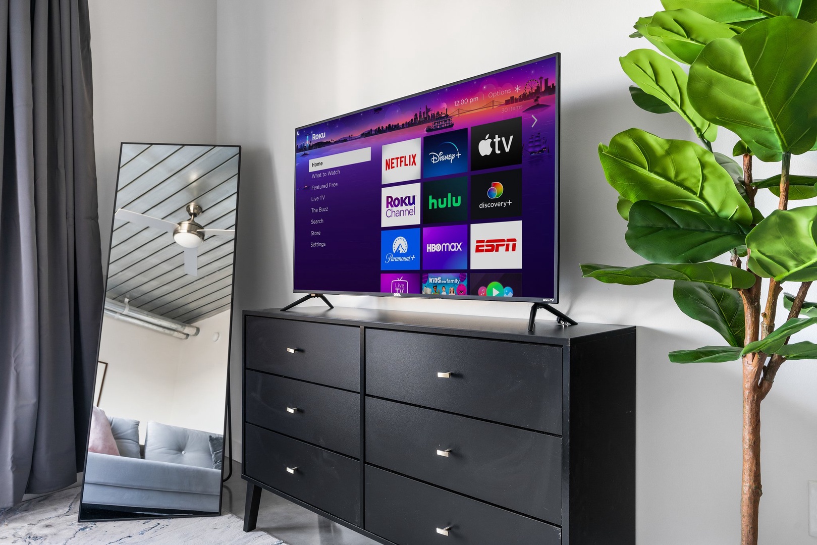 Tune in to your favorite shows with the smart TV and sound system for streaming.