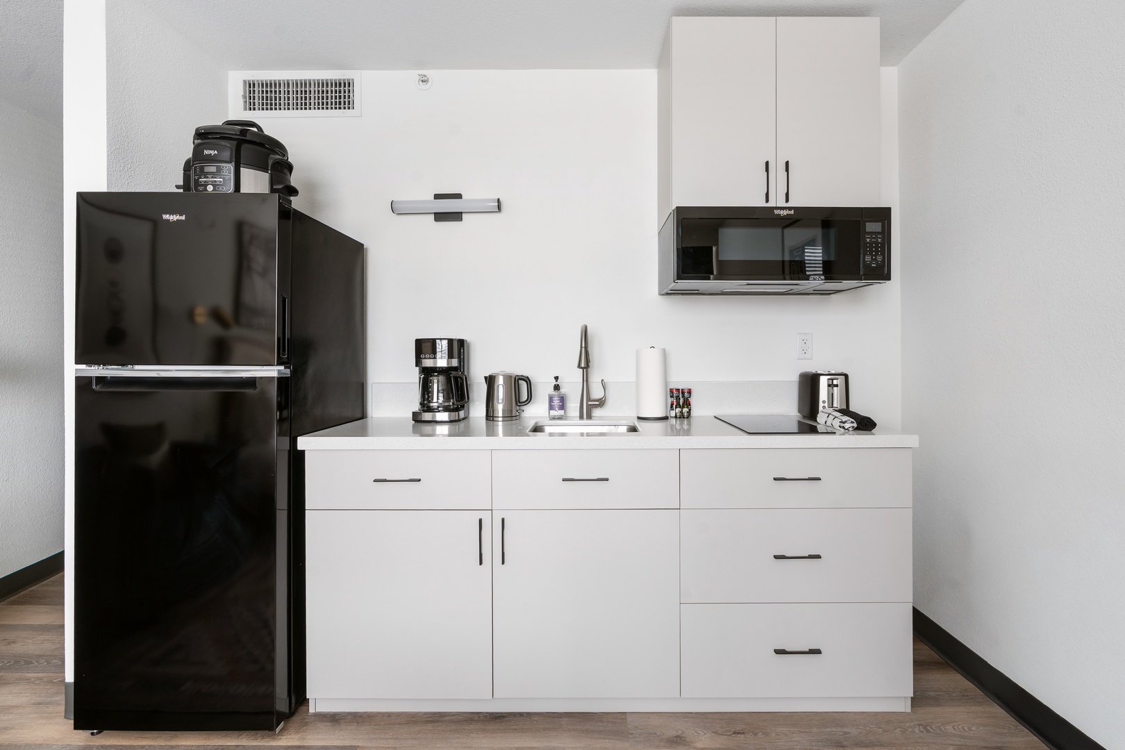 Cook up convenience in our kitchenette, stocked with the essentials.