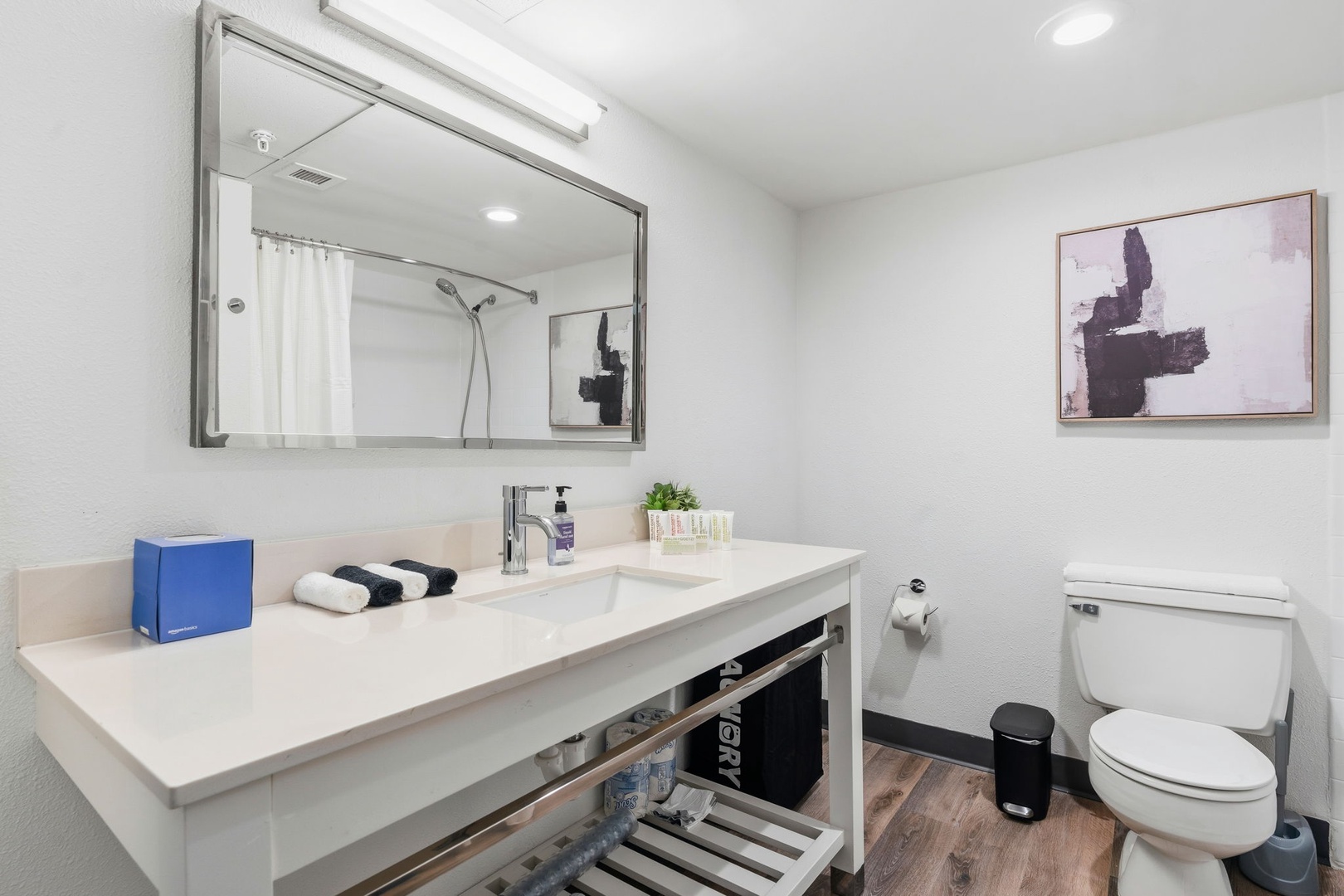 Freshen up in the bathroom with complimentary toiletries and a high pressure shower.