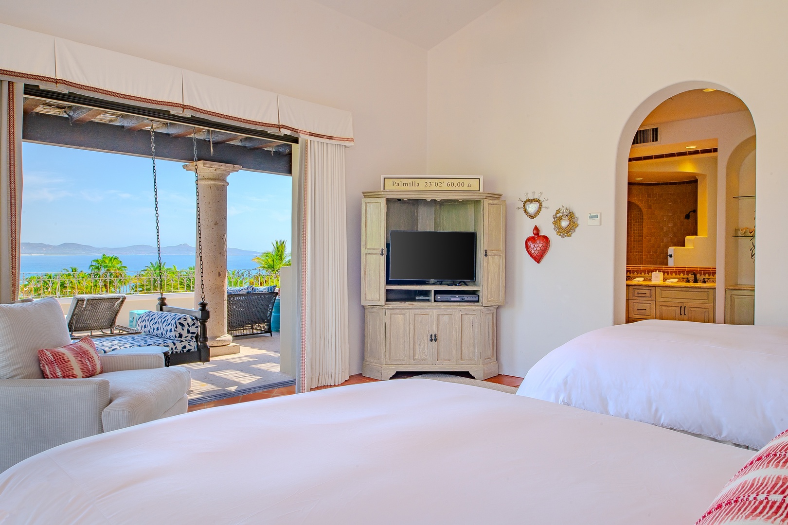 Wake up to breathtaking ocean views from your plush bed, with your own private terrace just steps away—where tropical breezes and endless blue horizons greet you each morning.