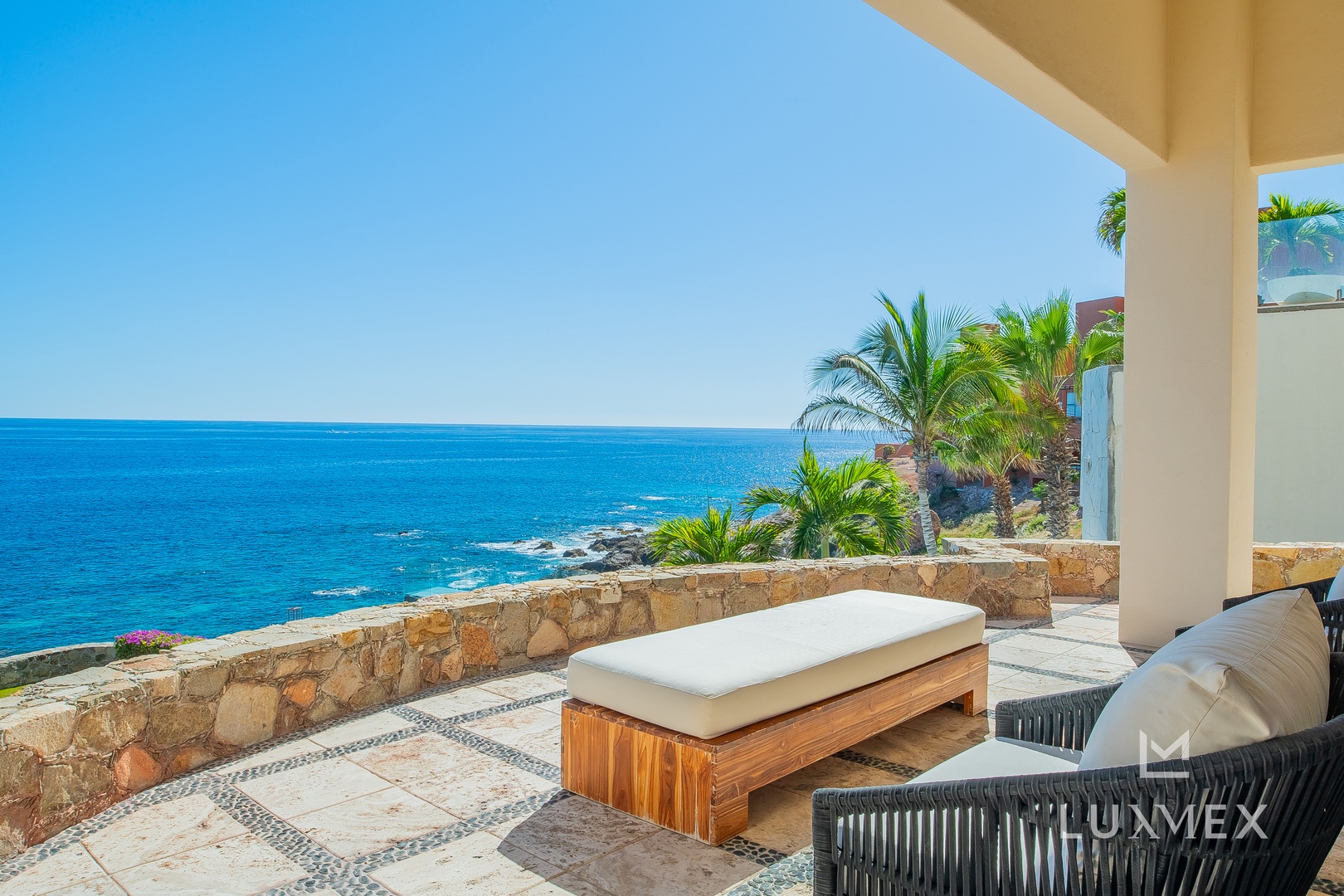 Unwind on your private terrace with stunning ocean views and tropical breezes surrounding you.