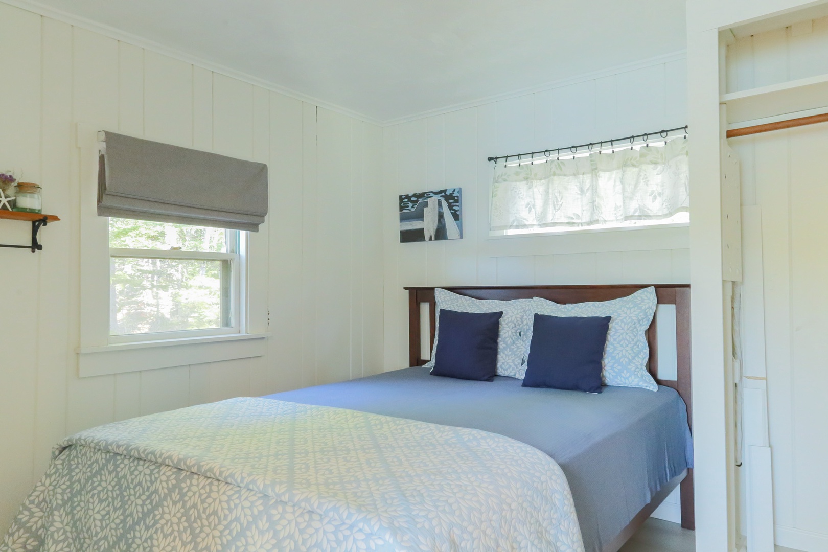 Drift off to sleep in your cozy bedroom with soft natural light filtering through the windows and fresh coastal breezes welcoming you home.