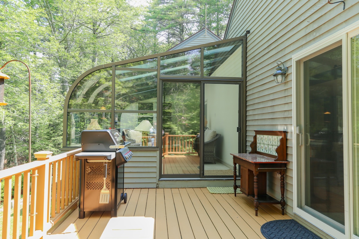 Your private deck awaits, complete with a grill for alfresco cooking and a glass solarium for enjoying forest views in any weather.
