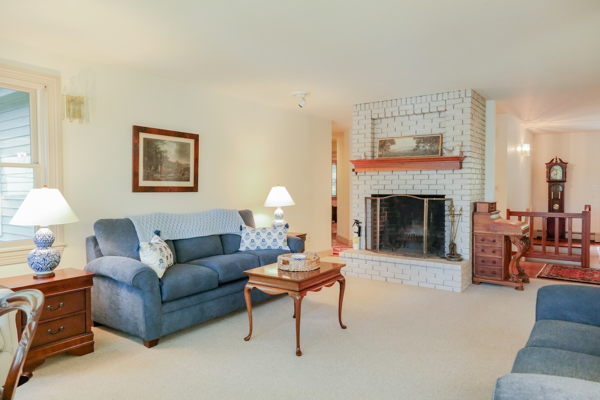 Settle into the comfort of your living space with plush seating and a cozy fireplace, perfect for unwinding after your daily adventures.