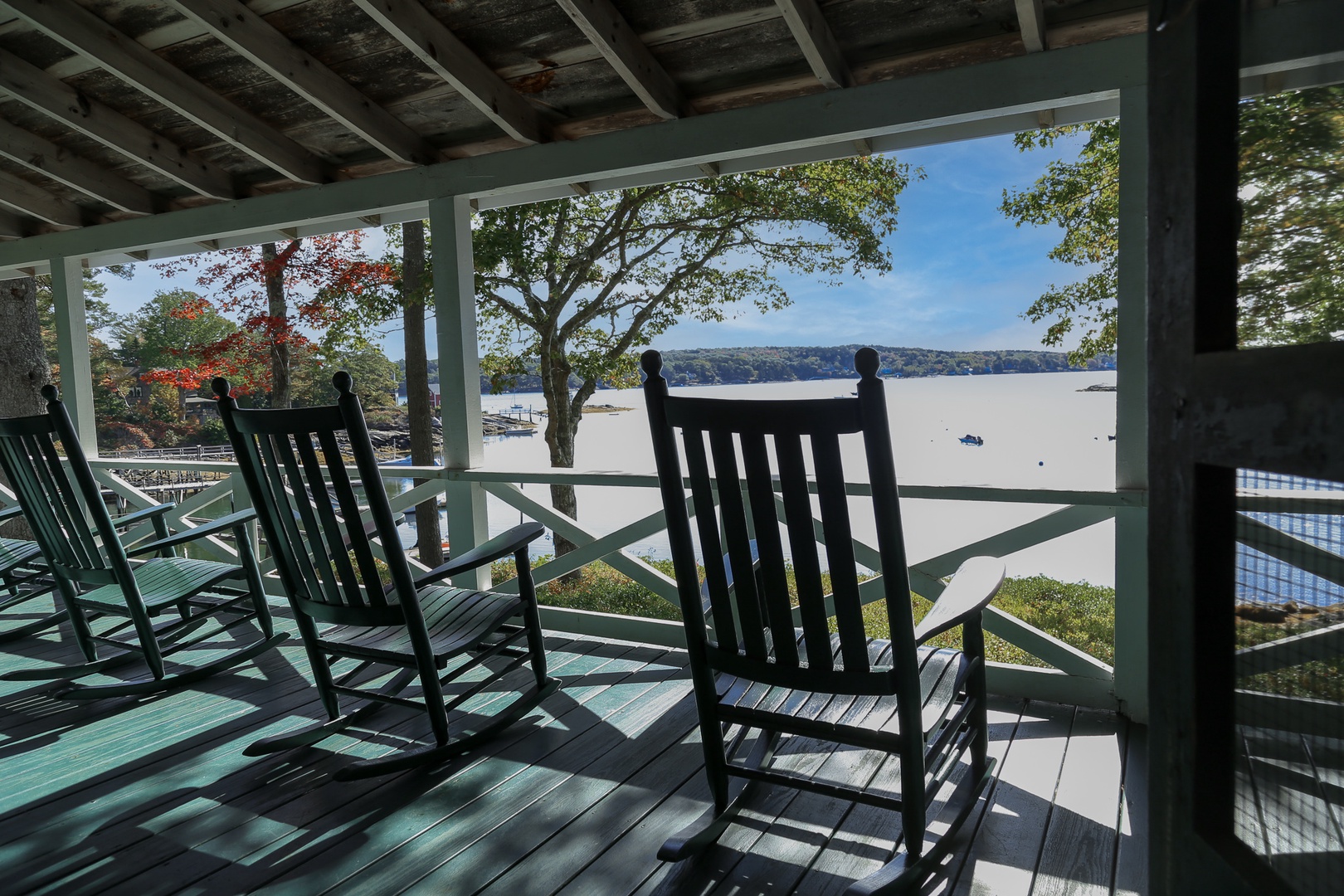 Cozy covered porch overlooking Linekin Bay.