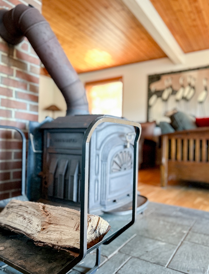 Cozy up by your wood-burning wood-stove, where a crackling fire create the perfect ambiance for relaxing evenings in this charming retreat.