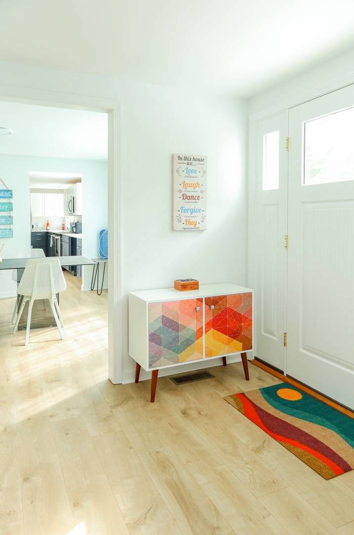 Step into your home-away-from-home through a bright, welcoming entryway that sets the tone for your entire stay with cheerful colors and thoughtful touches.