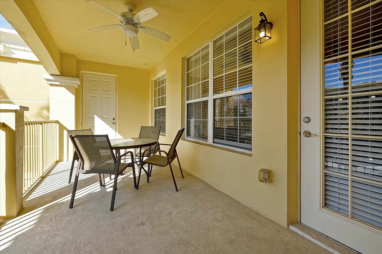 Your private balcony awaits with comfortable seating and refreshing ceiling fan for relaxing mornings or evening conversations.