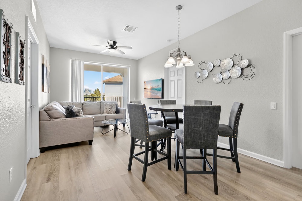 You'll love gathering around this elegant dining table with city views, then relaxing on the plush sectional sofa.