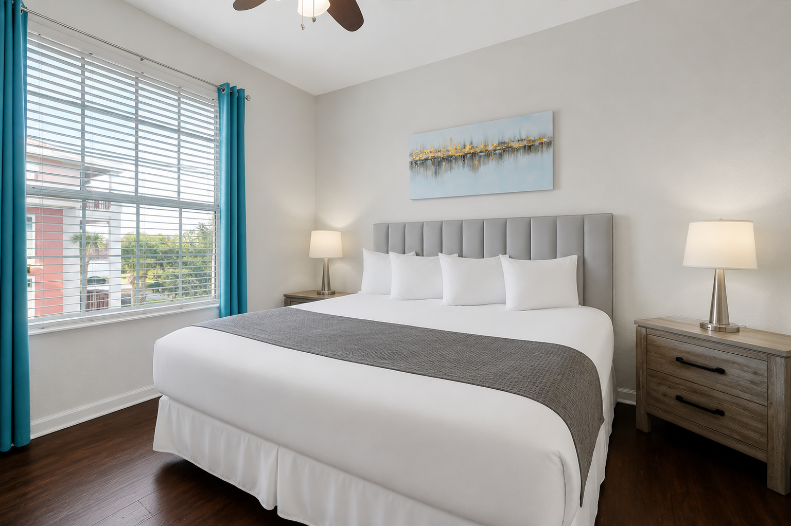 Delighful crisp white linens on your plush king bed with modern artwork and outside view , time to relax!