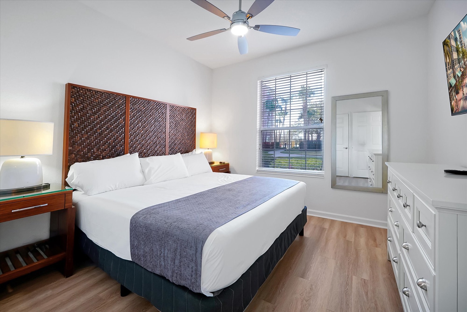 Unwind in your serene bedroom featuring crisp linens, warm lighting, and thoughtful touches that make you feel right at home.