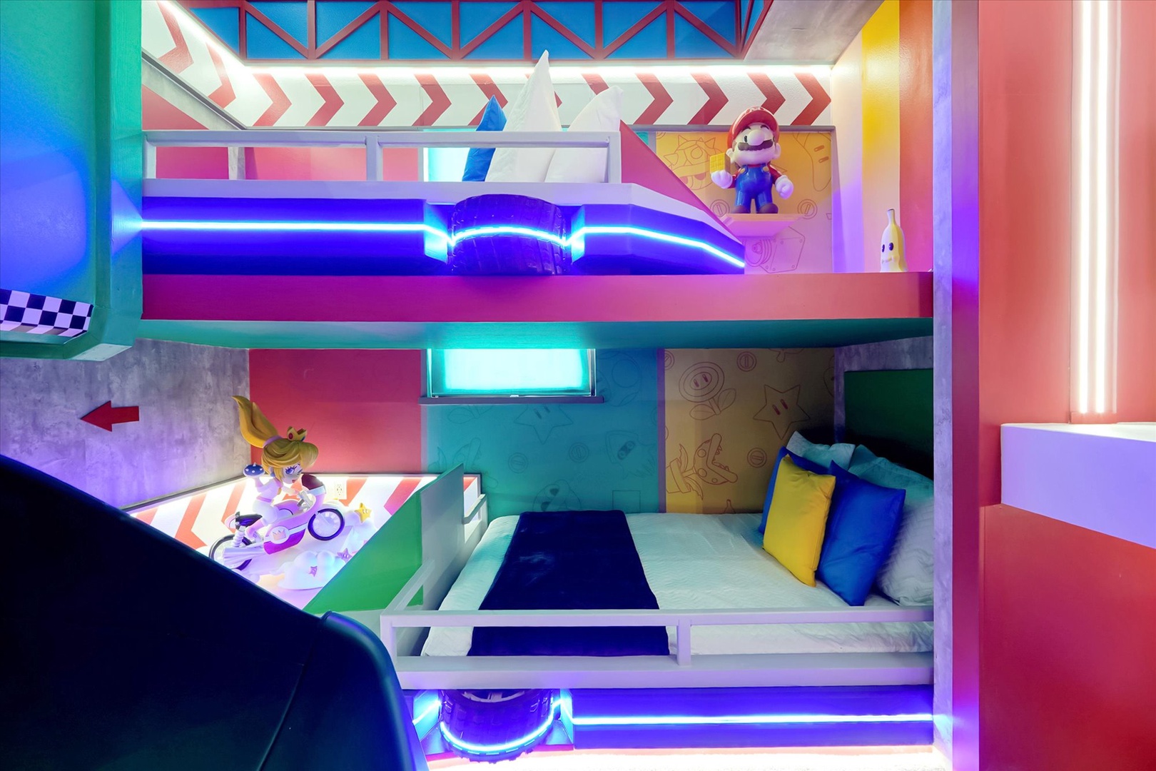 Your kids will love this vibrant bunk bed setup with colorful LED lighting, fun artwork, and a playful Mario-themed design that makes bedtime an adventure.