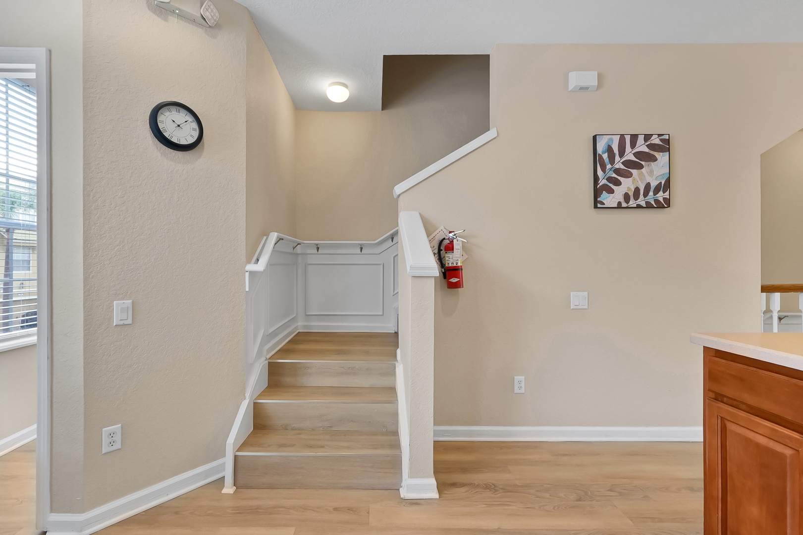 Your home-away-from-home features beautiful hardwood floors and elegant staircase leading to your upstairs retreat.