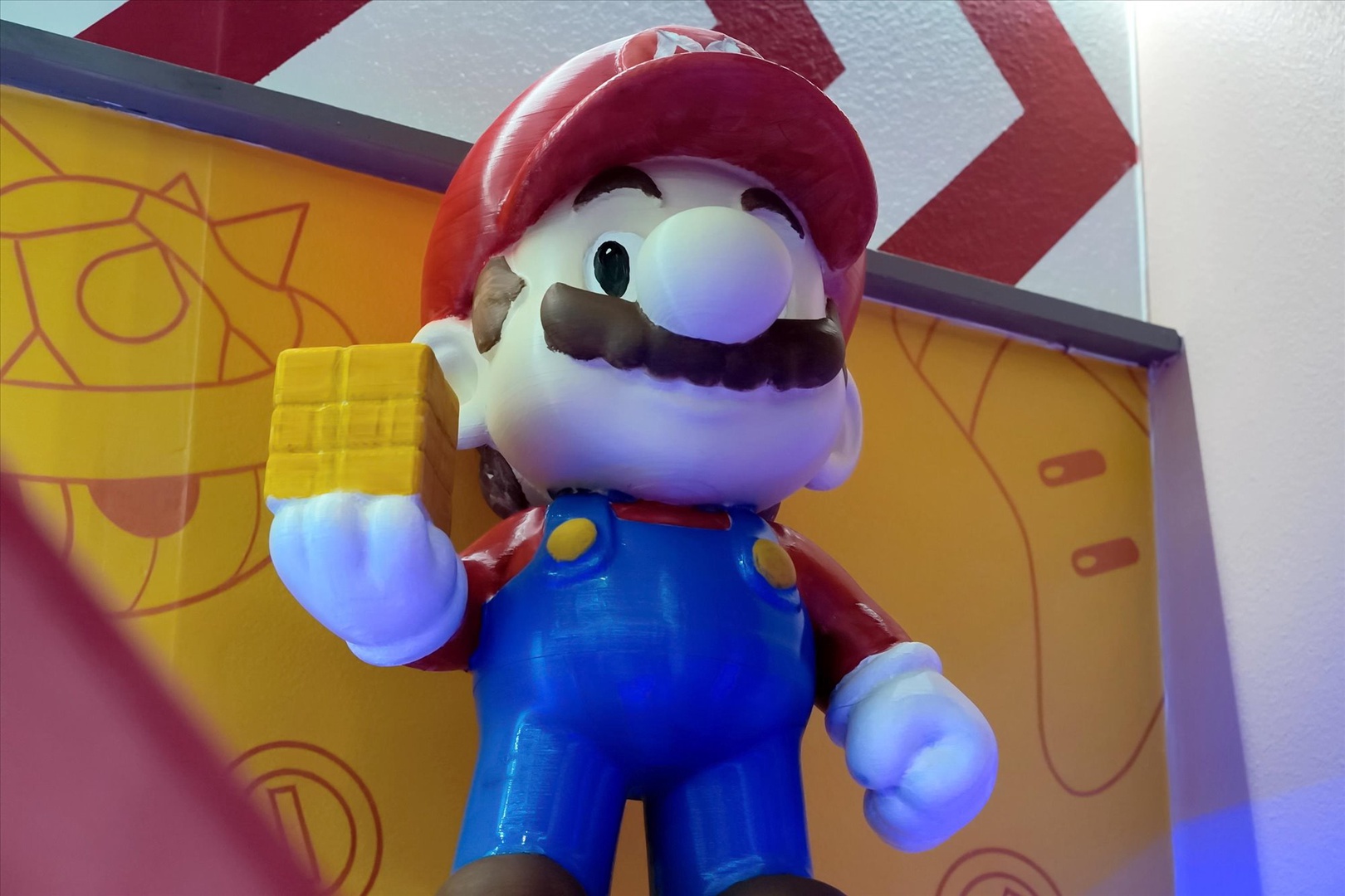 A cheerful character figure adds a playful, nostalgic touch to your stay, perfect for families or anyone young at heart.