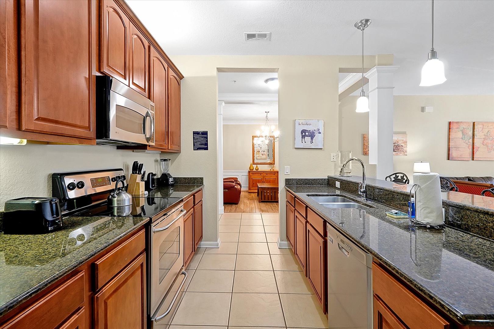 Your gourmet kitchen awaits with granite counters, warm wood cabinets, and modern appliances for creating memorable meals.