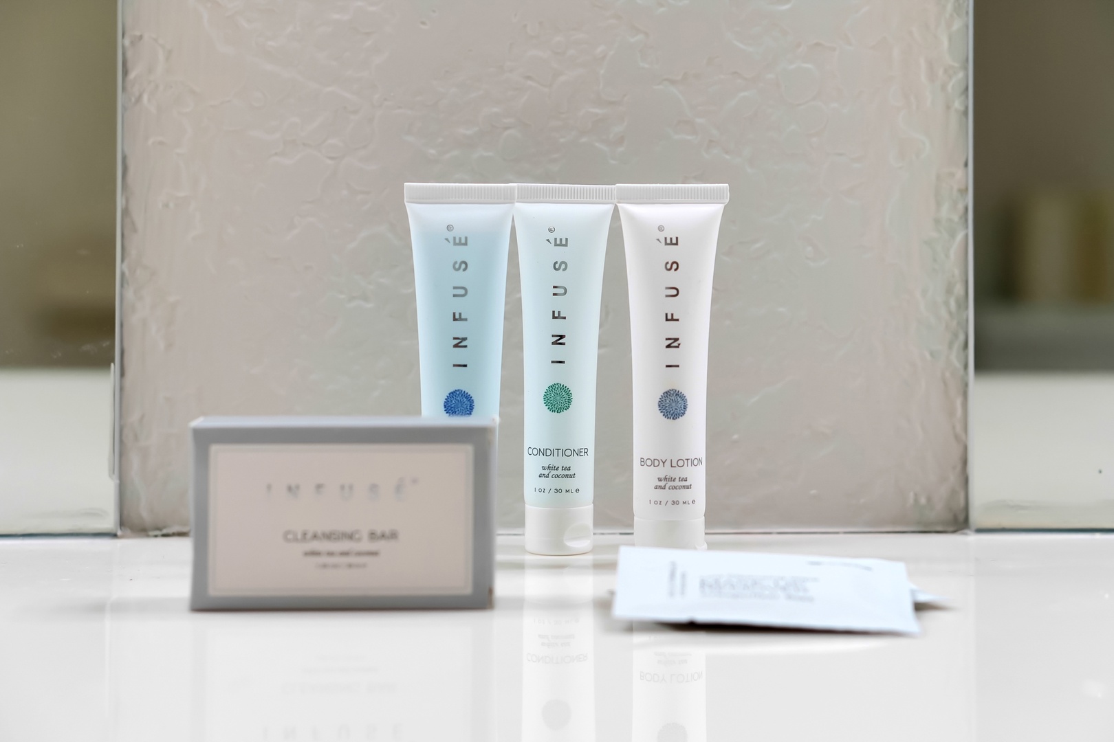 Premium toiletries await your arrival, featuring luxurious body lotion, conditioner, and cleansing essentials for your comfort.