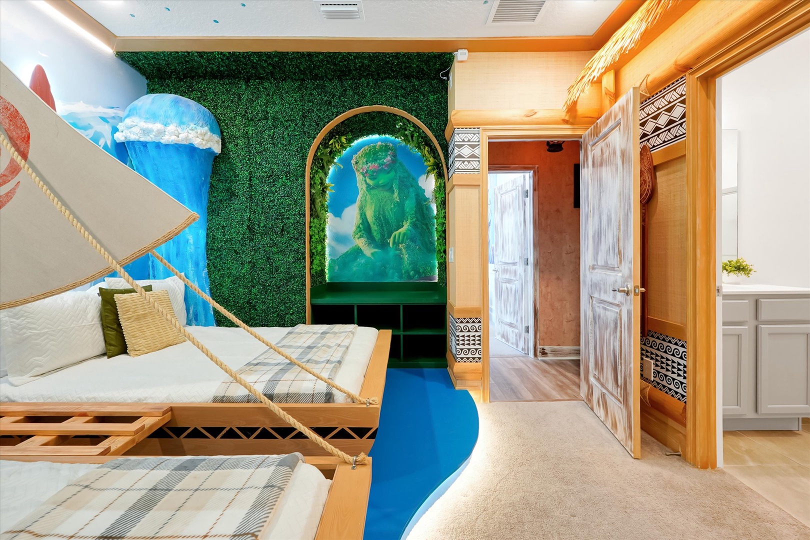 Step into a Polynesian paradise with ocean murals, lush greenery, and tropical-inspired decor that'll transport your imagination to an island retreat.