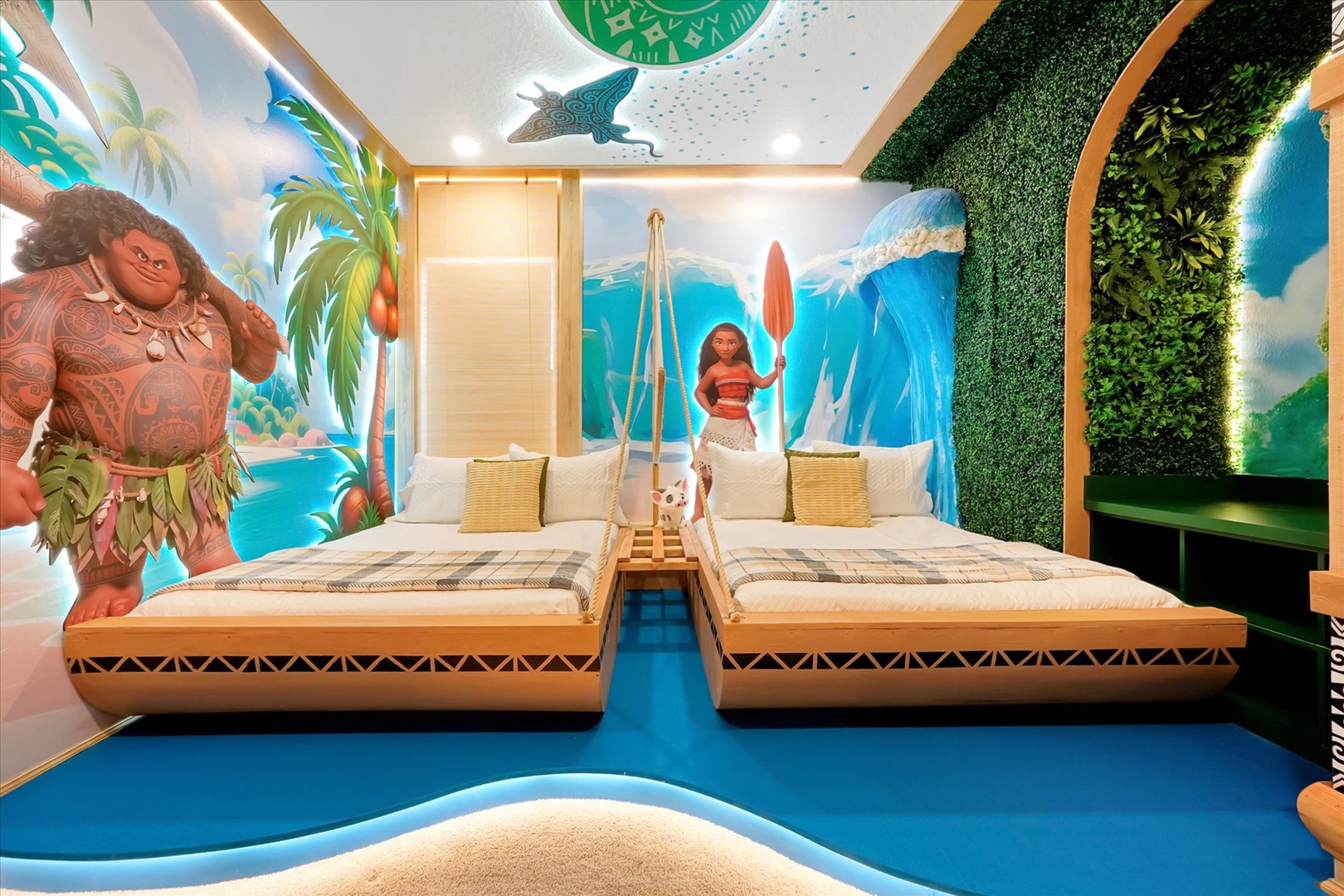 Step into your island paradise with tropical murals, a living green wall, and two plush beds that promise adventure and comfort for the whole family.