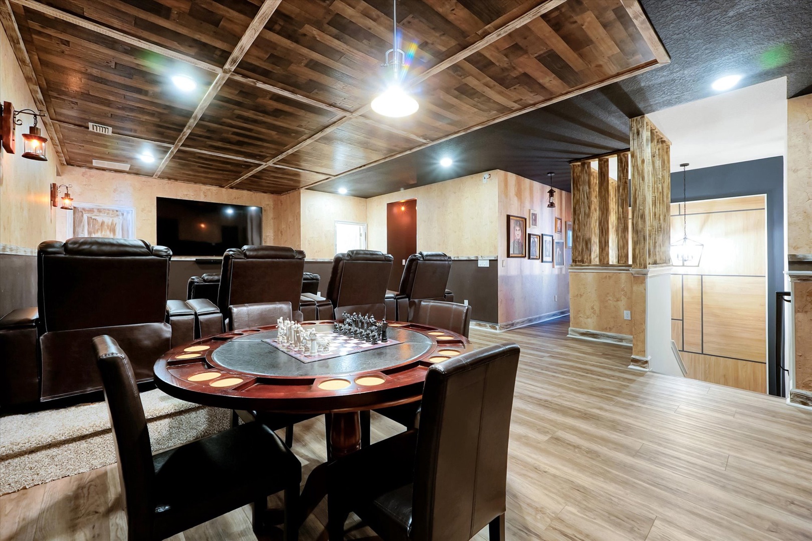 Gather around the game table or sink into plush leather seating beneath rustic wood-beam ceilings in your spacious entertainment area, perfect for unwinding after exploring the area.