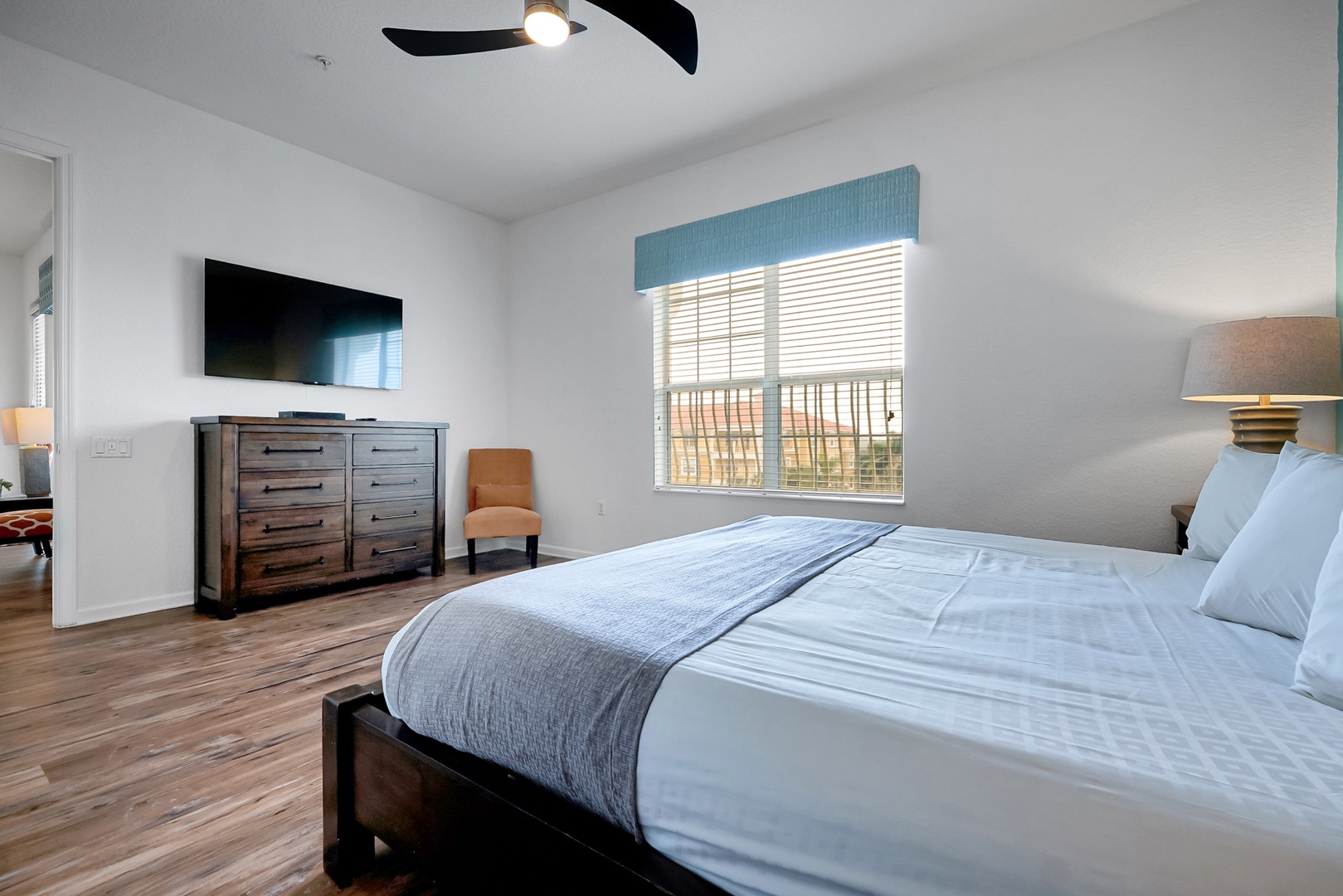 Slip into your serene bedroom retreat, where natural light and warm wood tones set the stage for restful nights and peaceful mornings.