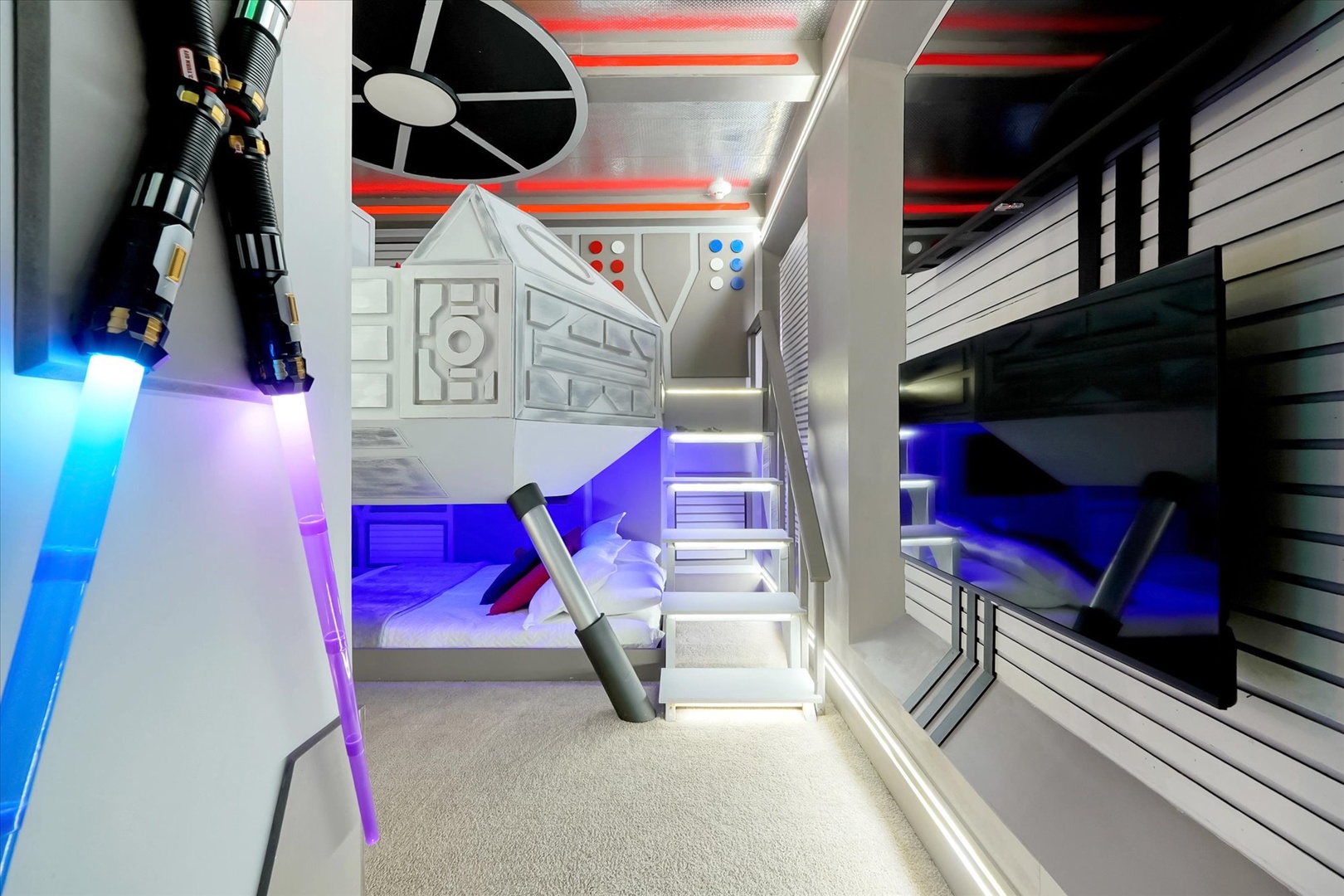 Your kids will love this sci-fi themed bedroom with glowing lightsaber accents, custom bunk beds, and immersive decor that transforms bedtime into an intergalactic adventure.