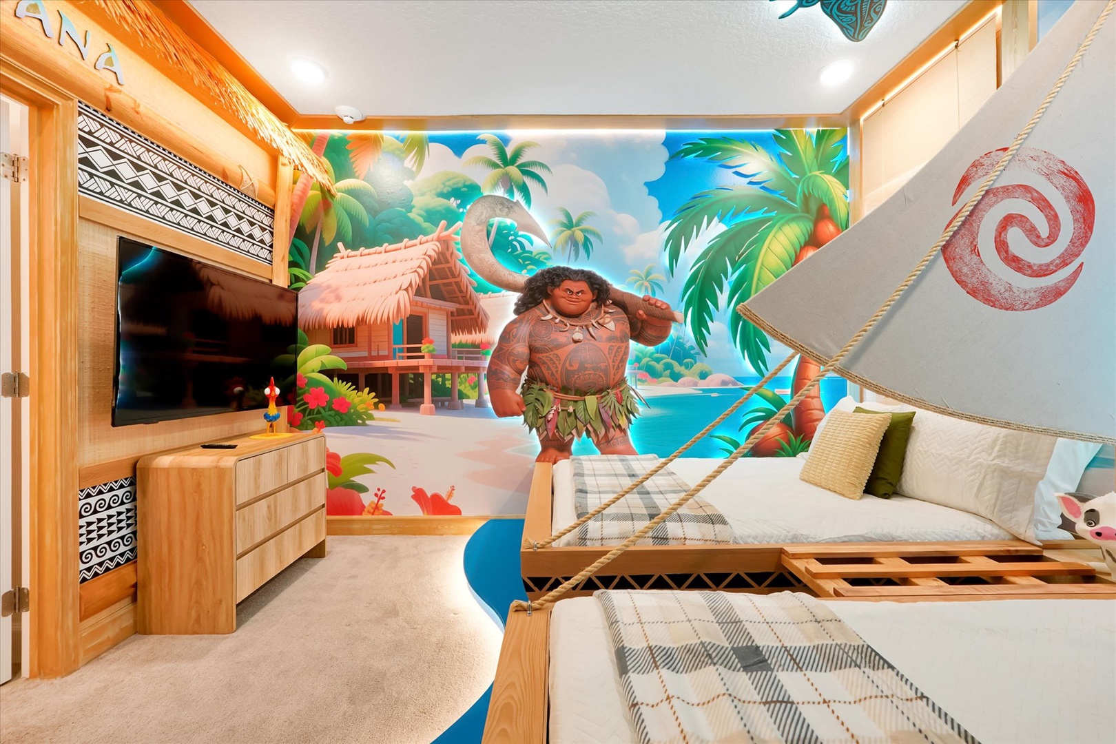 Step into a tropical adventure in this vibrant themed bedroom where island dreams come alive. Twin beds frame a stunning beach mural while warm wood tones create your cozy coastal retreat.