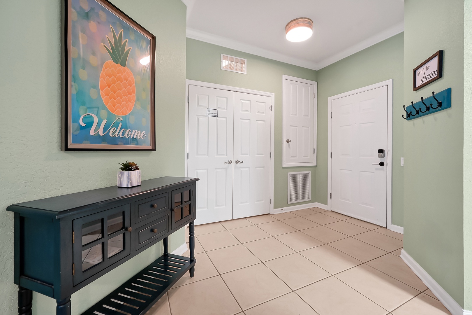 Step into your welcoming retreat where cheerful pineapple art and thoughtful touches create the perfect vacation mood from the moment you arrive.