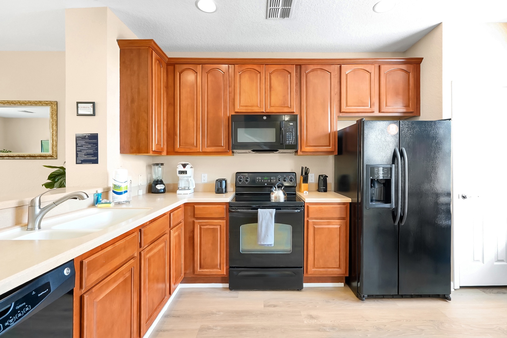 Your fully equipped kitchen features warm wood cabinets, modern appliances, and everything you need to create delicious meals during your stay.