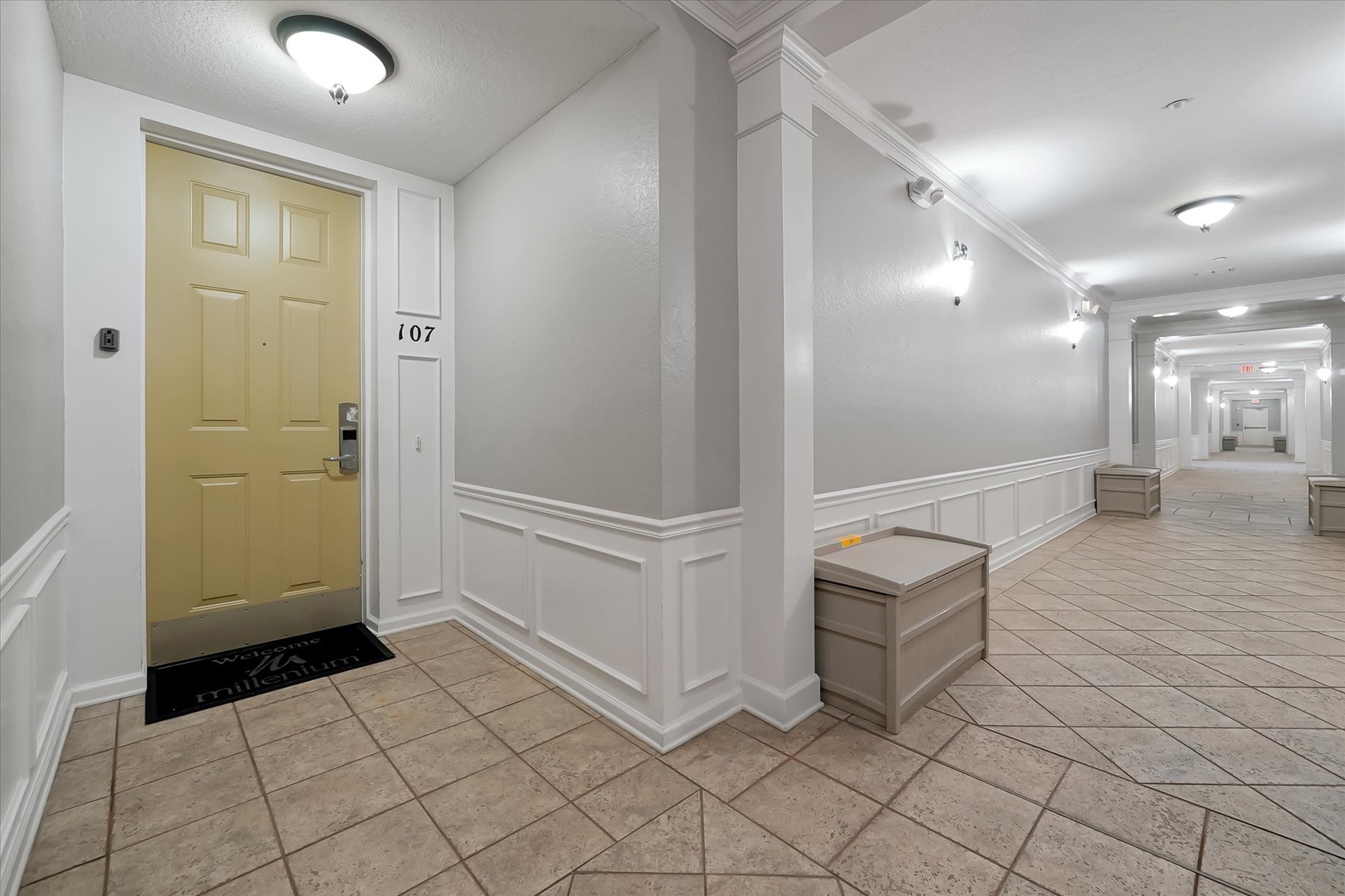 Clean hallway leads to your comfortable accommodations with elegant wainscoting and thoughtful seating areas throughout.