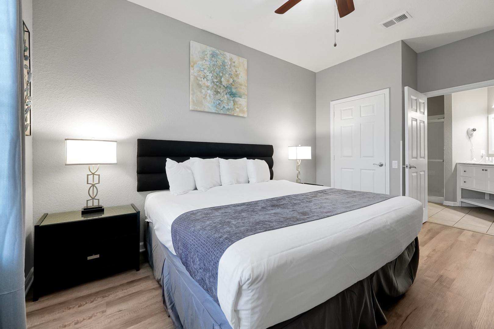 Slip into fresh, cloud-soft linens after a long day—your serene bedroom is a peaceful retreat with hotel-quality bedding, stylish fixtures, and an en-suite bathroom just steps away.