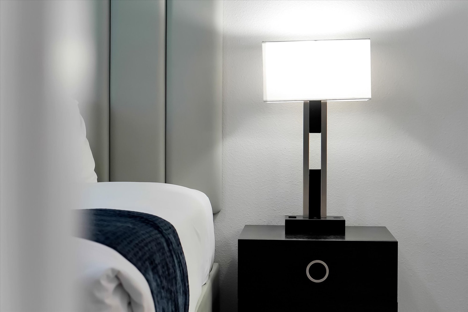 Unwind in your stylish bedroom with contemporary furnishings and warm lighting for peaceful evenings.