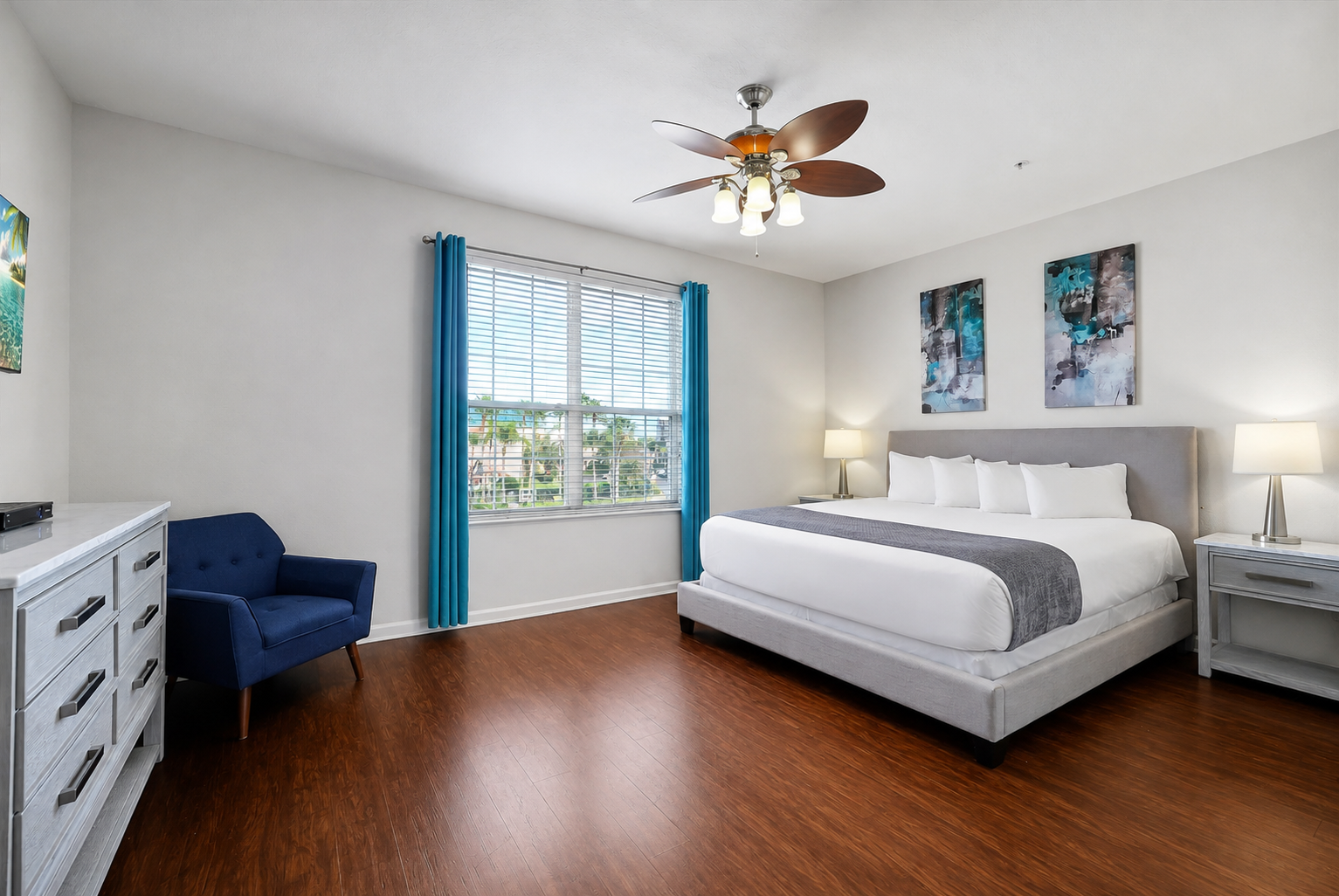 Sink into comfort with crisp linens and modern touches in your spacious bedroom retreat