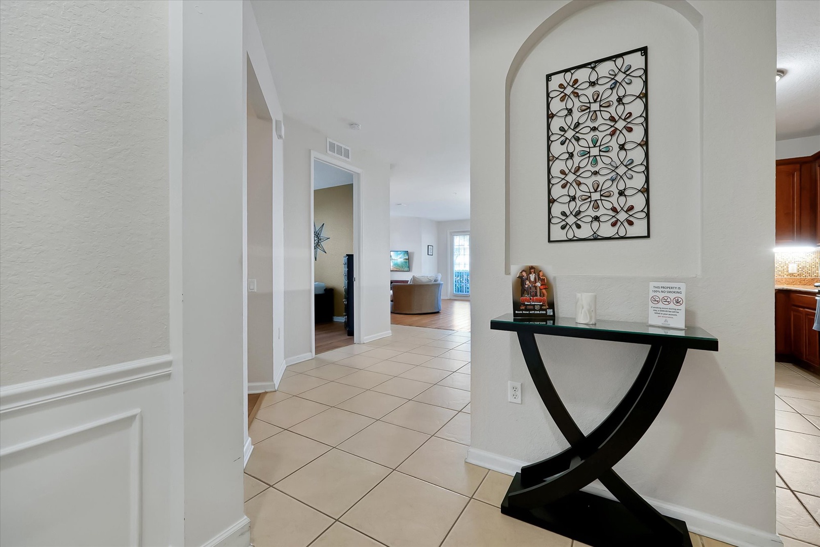 Step into your elegant entryway with beautiful tile flooring and stylish decor that sets the tone for your relaxing stay.