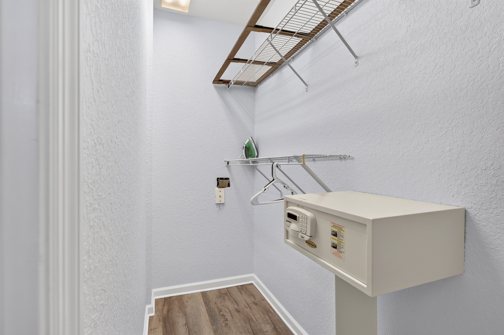 Your walk-in closet offers organized storage with built-in shelving, hanging rods, and a convenient in-room safe to keep your valuables secure during your stay.