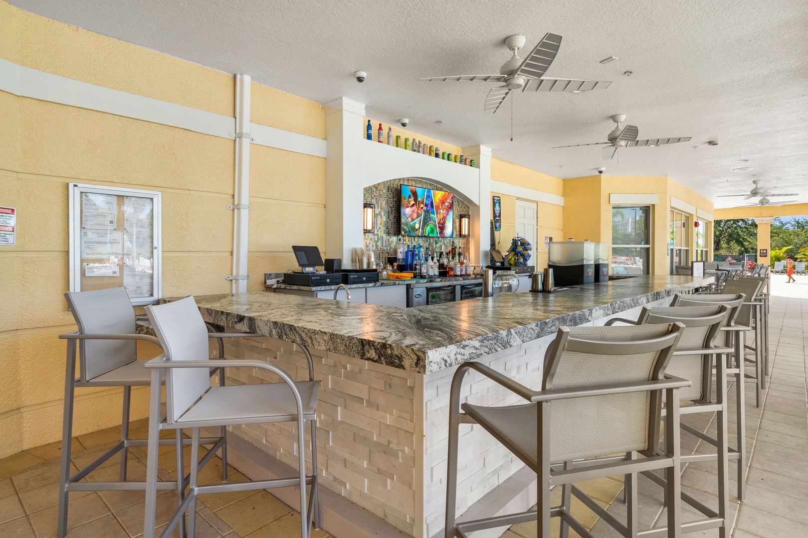 Pull up a seat at your private bar, where drinks are ready and the tropical vibe invites you to unwind in style under the open sky.