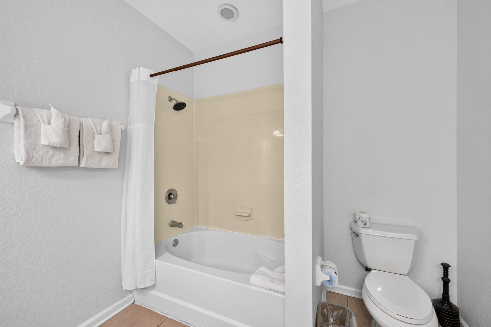 Your private bathroom features a soaking tub with shower, fresh towels, and everything you need for a comfortable stay.