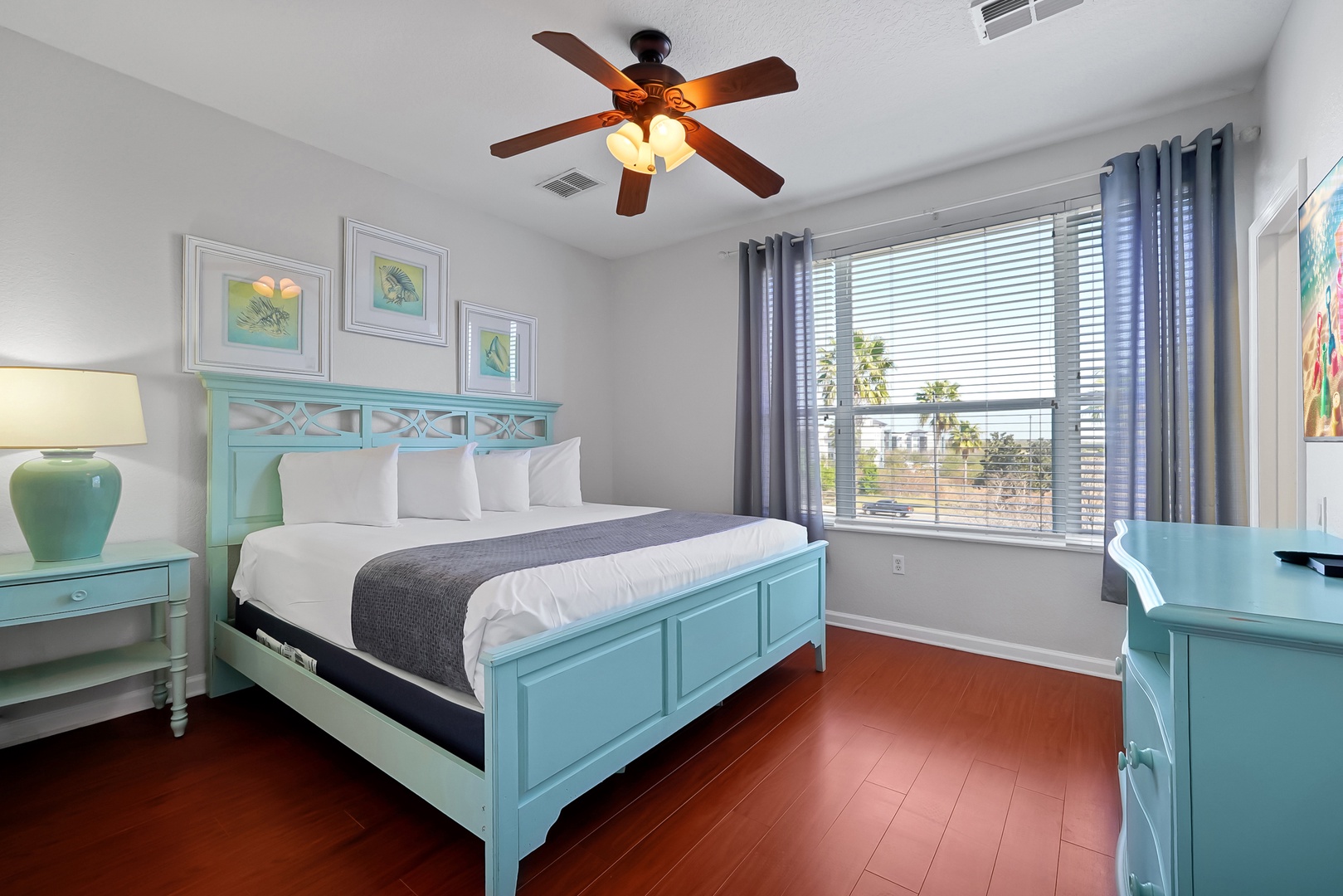 Drift off in your coastal-inspired bedroom with turquoise furniture and crisp linens, while palm trees sway outside your window.