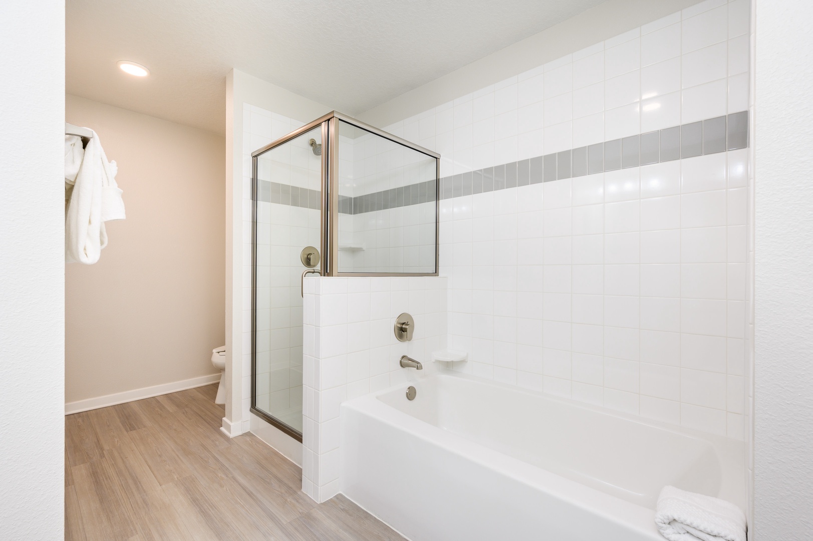 Step into your pristine bathroom with a spacious walk-in shower and luxurious soaking tub—perfect for unwinding after your adventures.