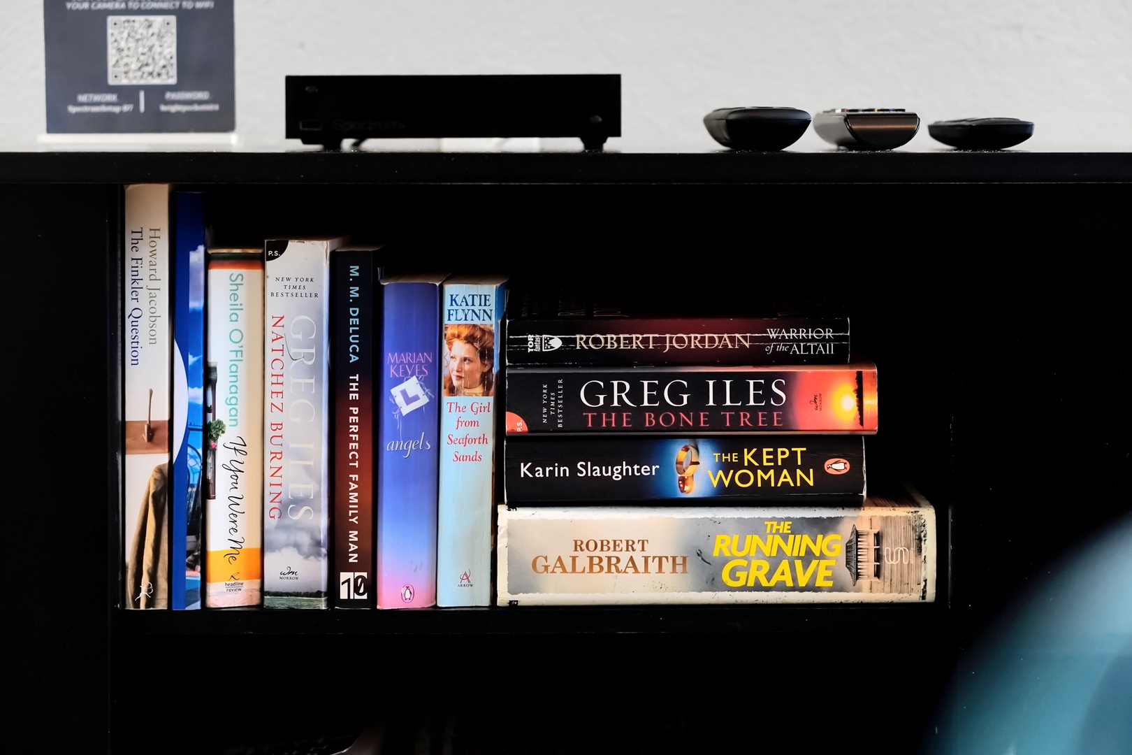 Curl up with your favorite bestseller from the well-stocked bookshelf—perfect for quiet evenings in.