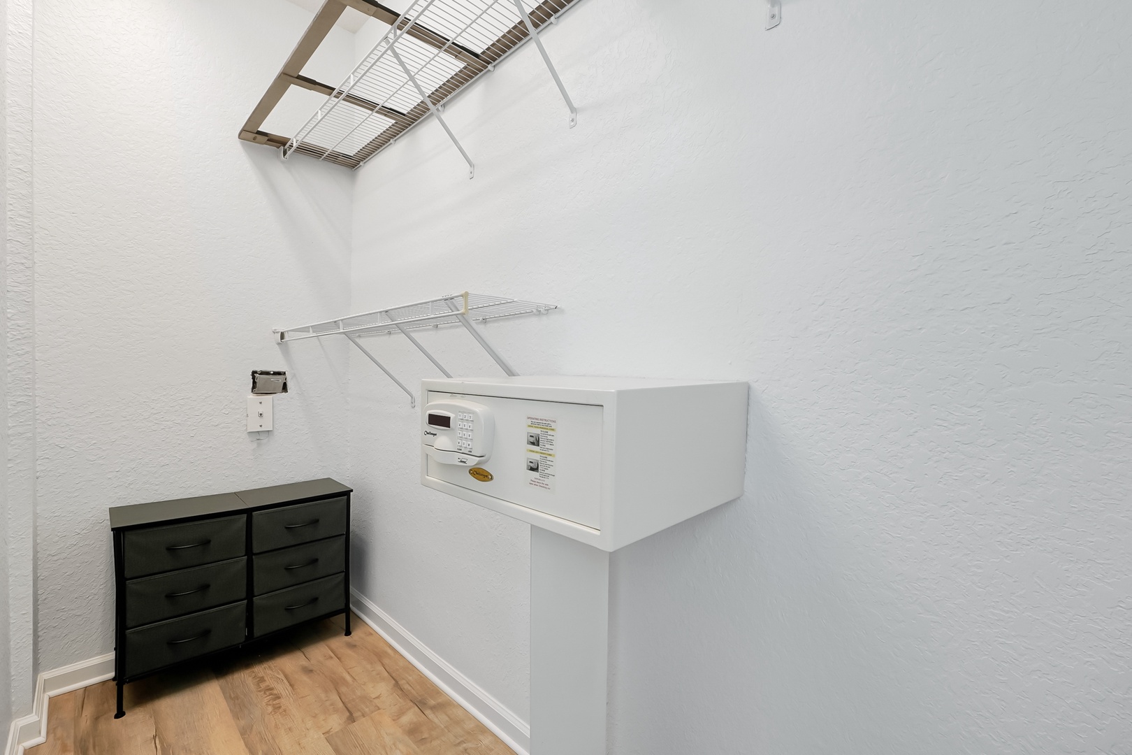 Your dedicated laundry room keeps your vacation wardrobe fresh with convenient washer access and ample storage space.