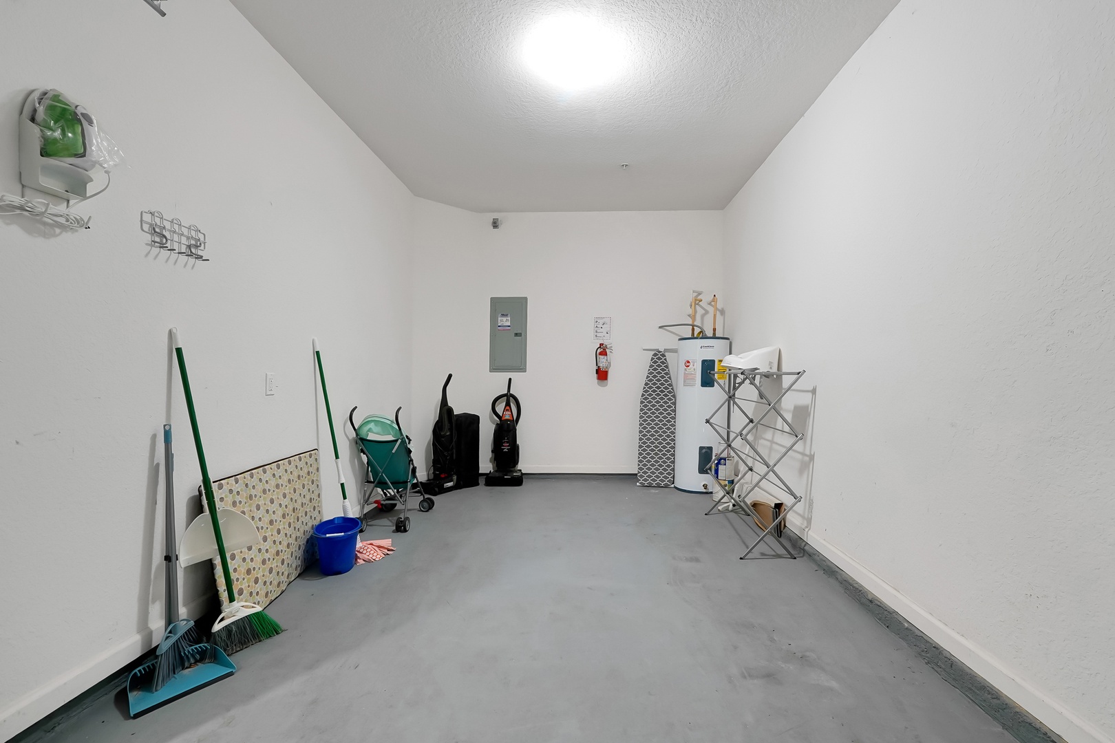A dedicated utility room provides convenient storage and workspace for your cleaning supplies and household needs.