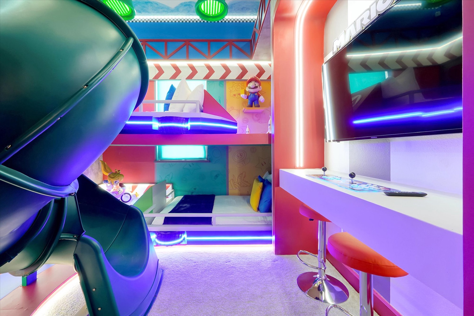 An incredible indoor play paradise featuring a two-story slide, arcade games, neon LED lighting, and whimsical décor that will delight children throughout their stay.