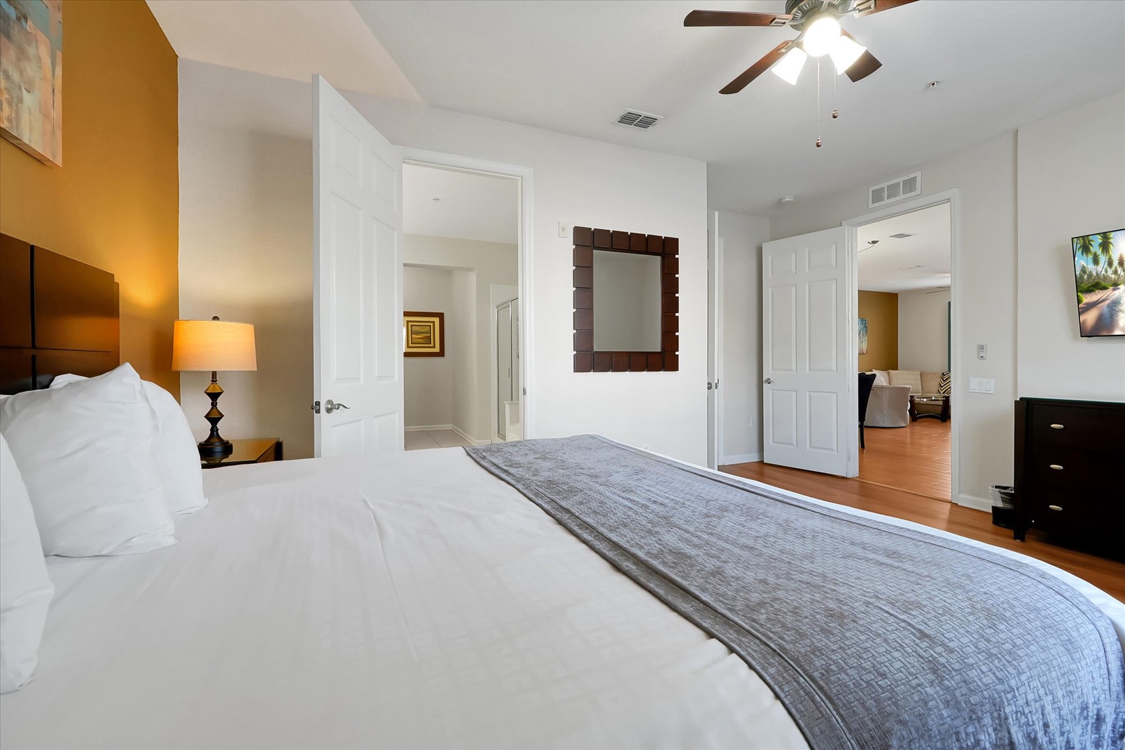 Your spacious bedroom offers plush bedding and contemporary furnishings for the perfect night's rest.