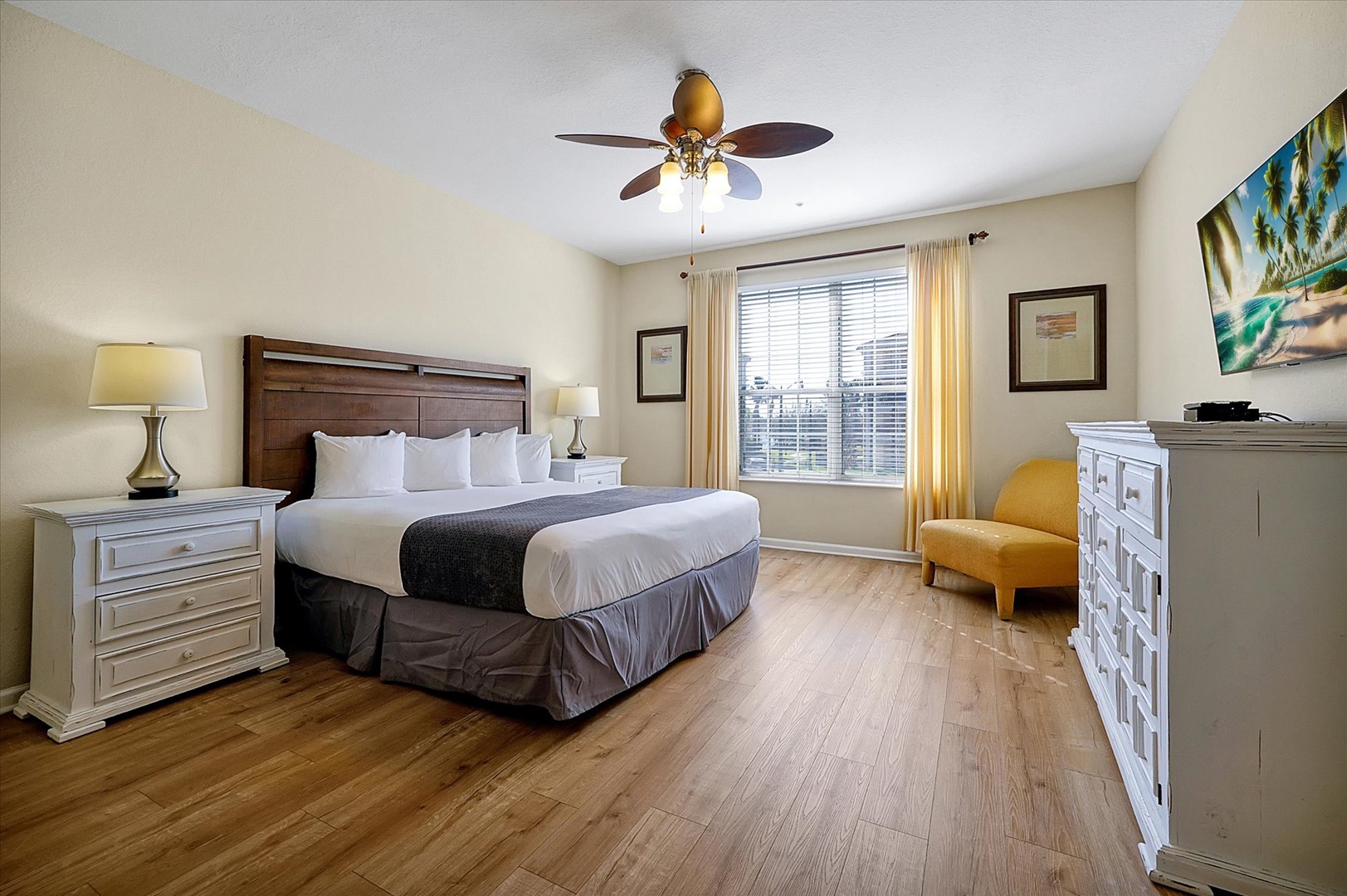 Unwind in your comfortable bedroom featuring crisp linens, warm wood floors, and a cozy reading chair by the window.