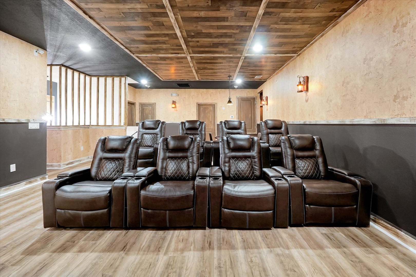 Your private movie theater awaits with plush leather recliners and stadium seating. Gather for unforgettable film nights in your own luxurious home cinema.
